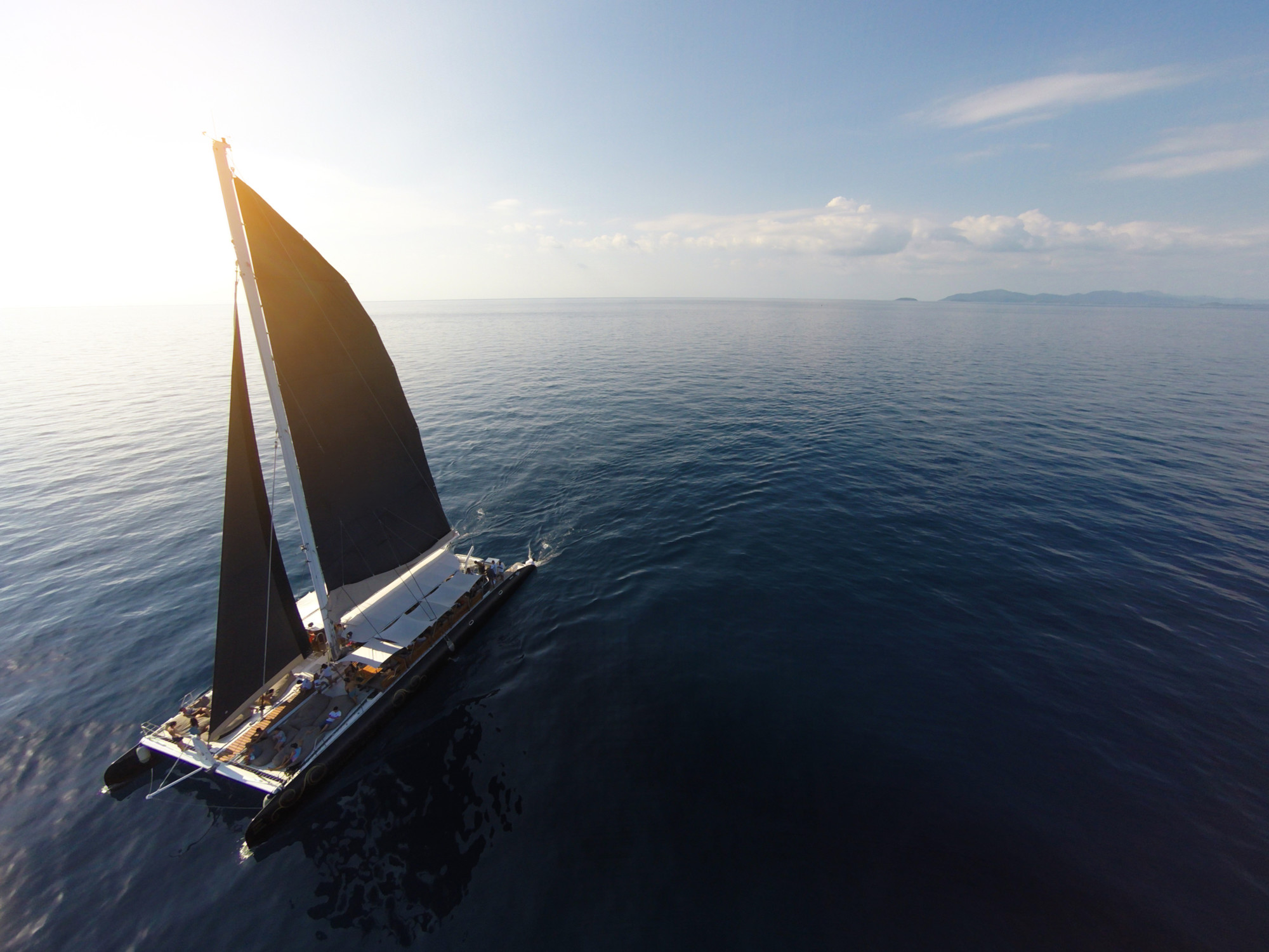 Amazing view to Yacht sailing in open sea at windy day. Drone vi
